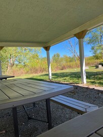 Covered seating area outside the hotel.