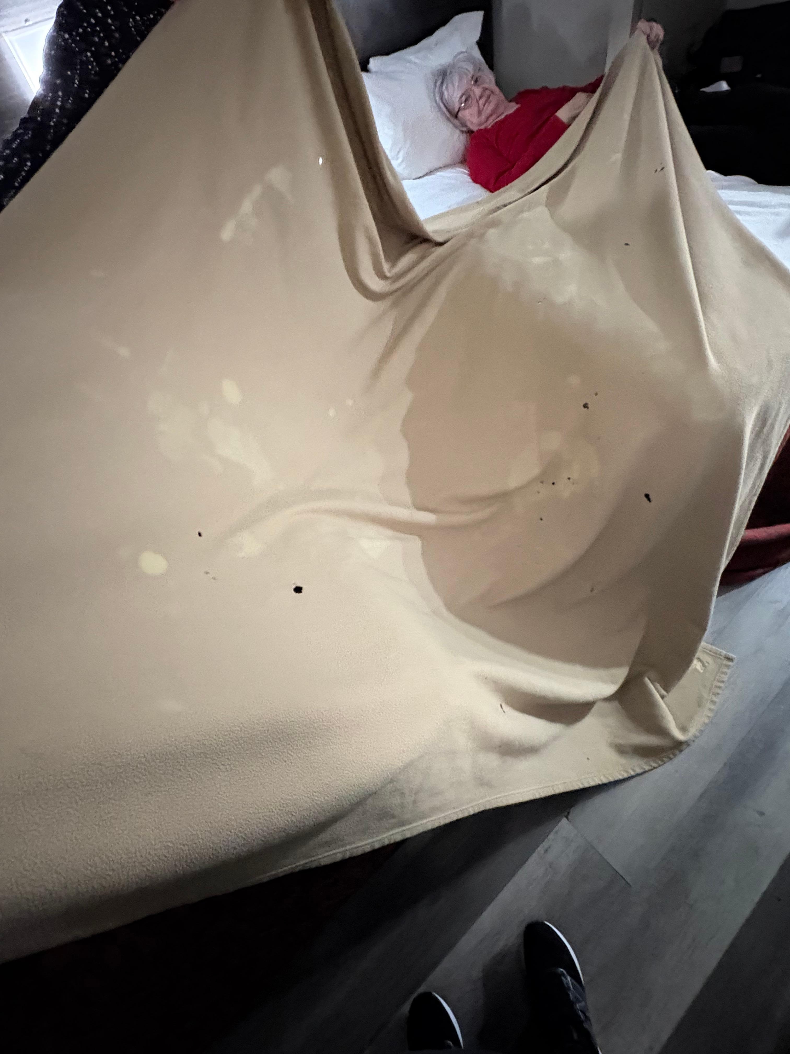 Burn holes in blanket 