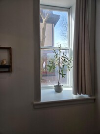 Side windows to walkway between buildings from one side