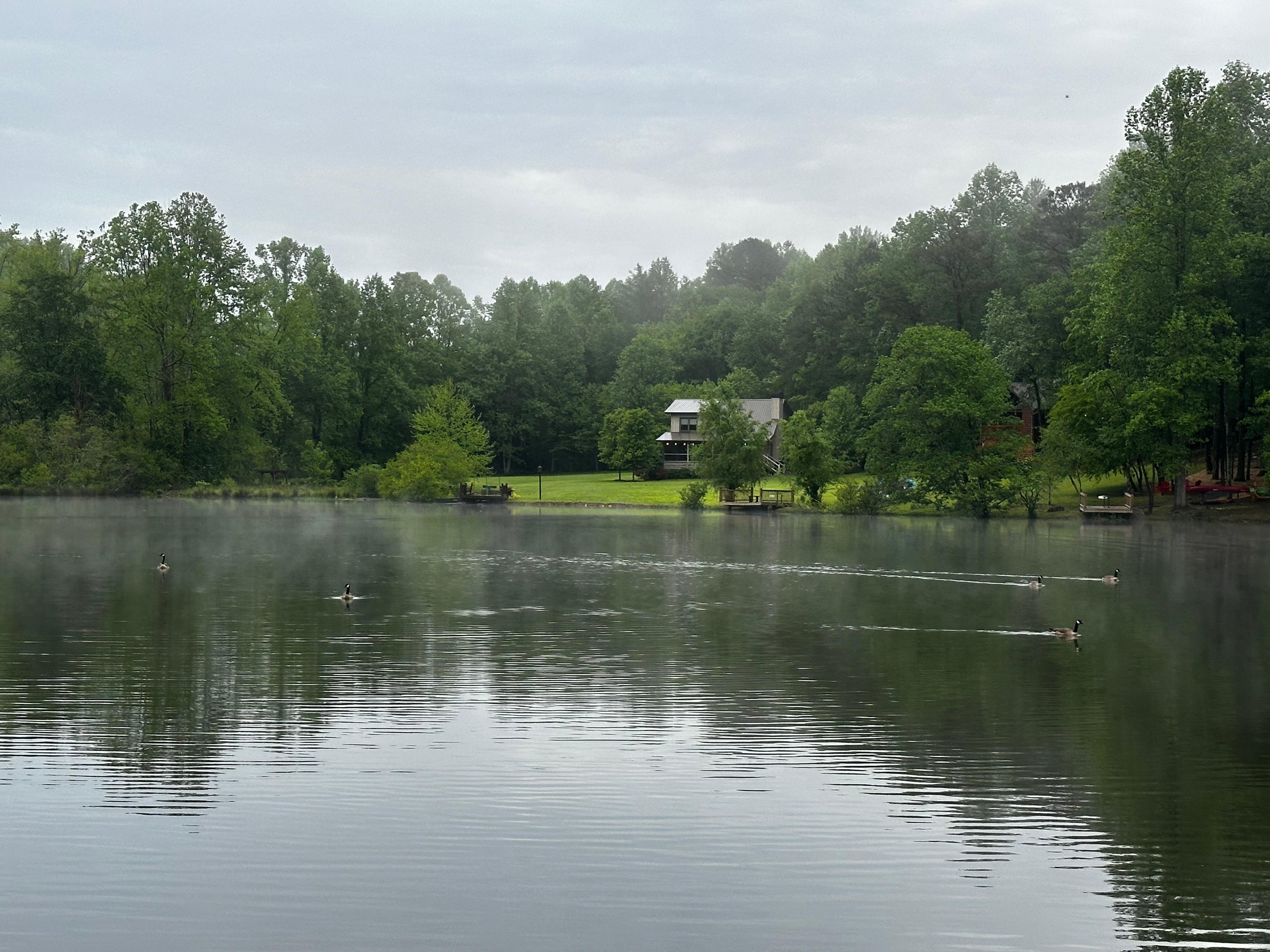 Lake view after a bit of rain, and enjoying a glass of wine on the dock.