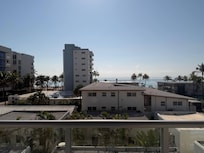 Room balcony back to beach.