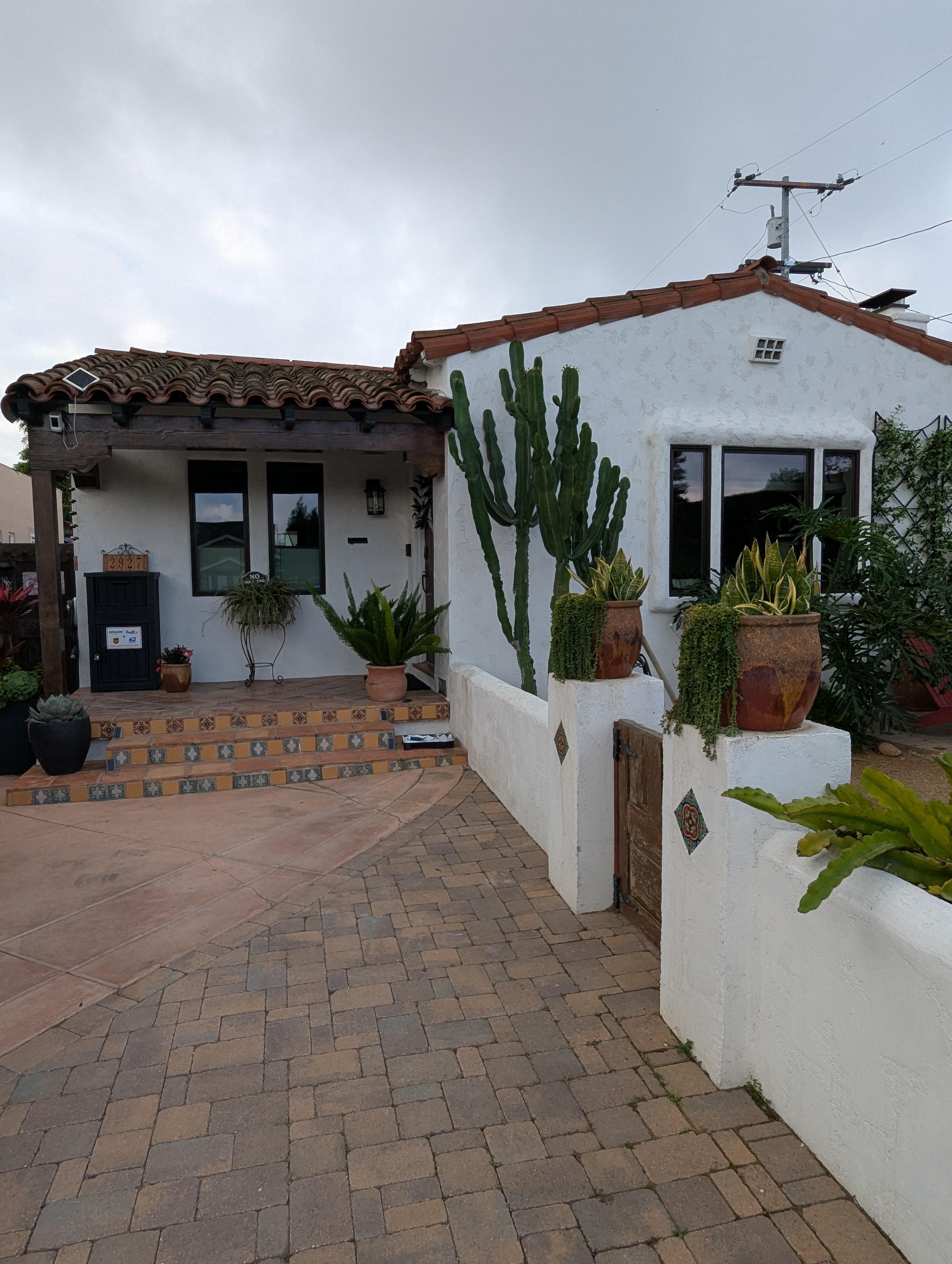 Host's home. The private gate to the casita is to the left, unseen in this photo. You walk through the gate and proceed through a walkway back to the casita.