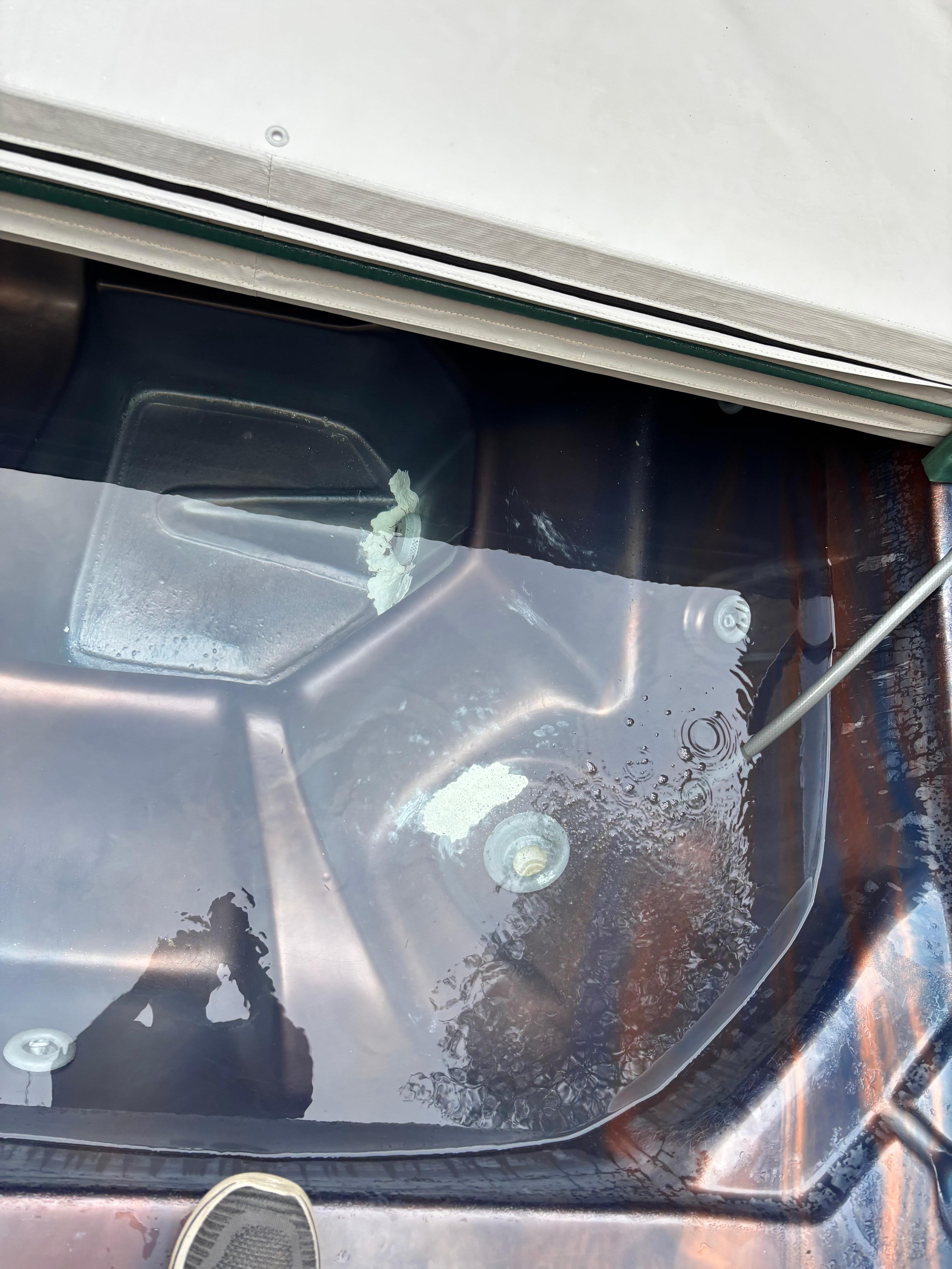 Hot tub with gobs of caulk around the jets