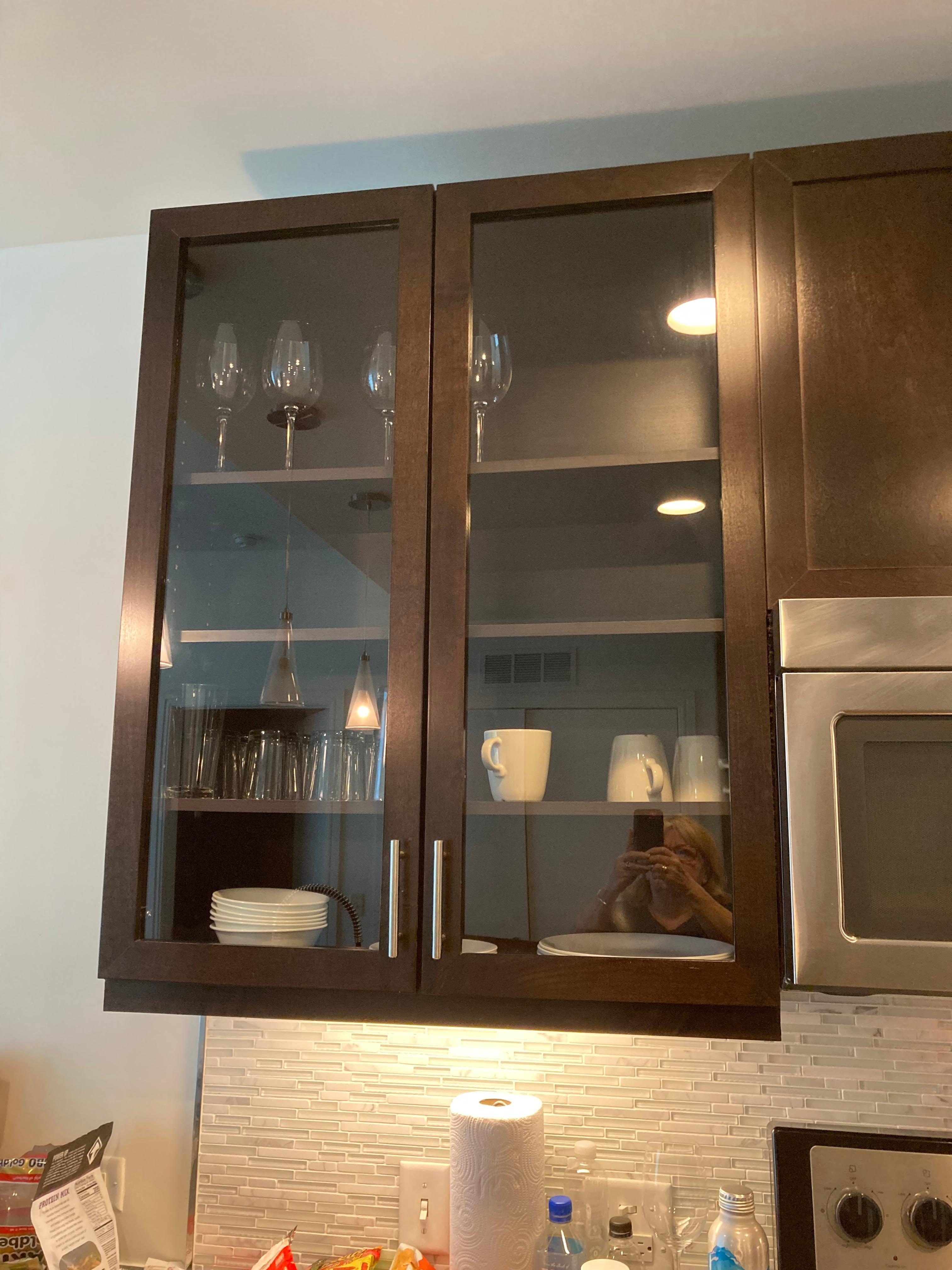 Glasses weren't in reach with no step stool or chair to stand on, very dangerous.
