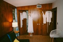 I (the bride) did my hair & makeup at the dining room table and got dressed in this room at the end of the hallway. The groom hung out downstairs in the game room
