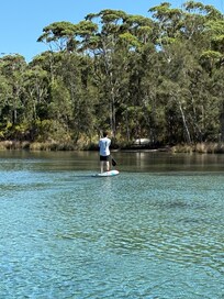 Paddle boarding at high tide. Put in right across the street from the house