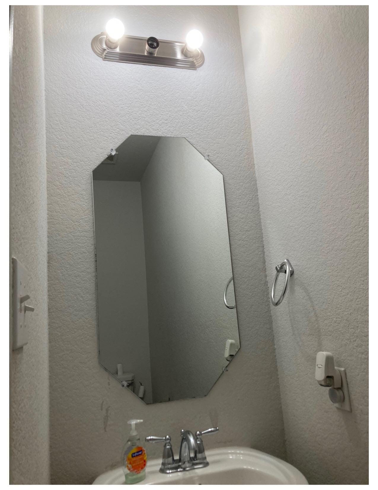 Missing light bulb in bathroom.  Also, no exterior light out front