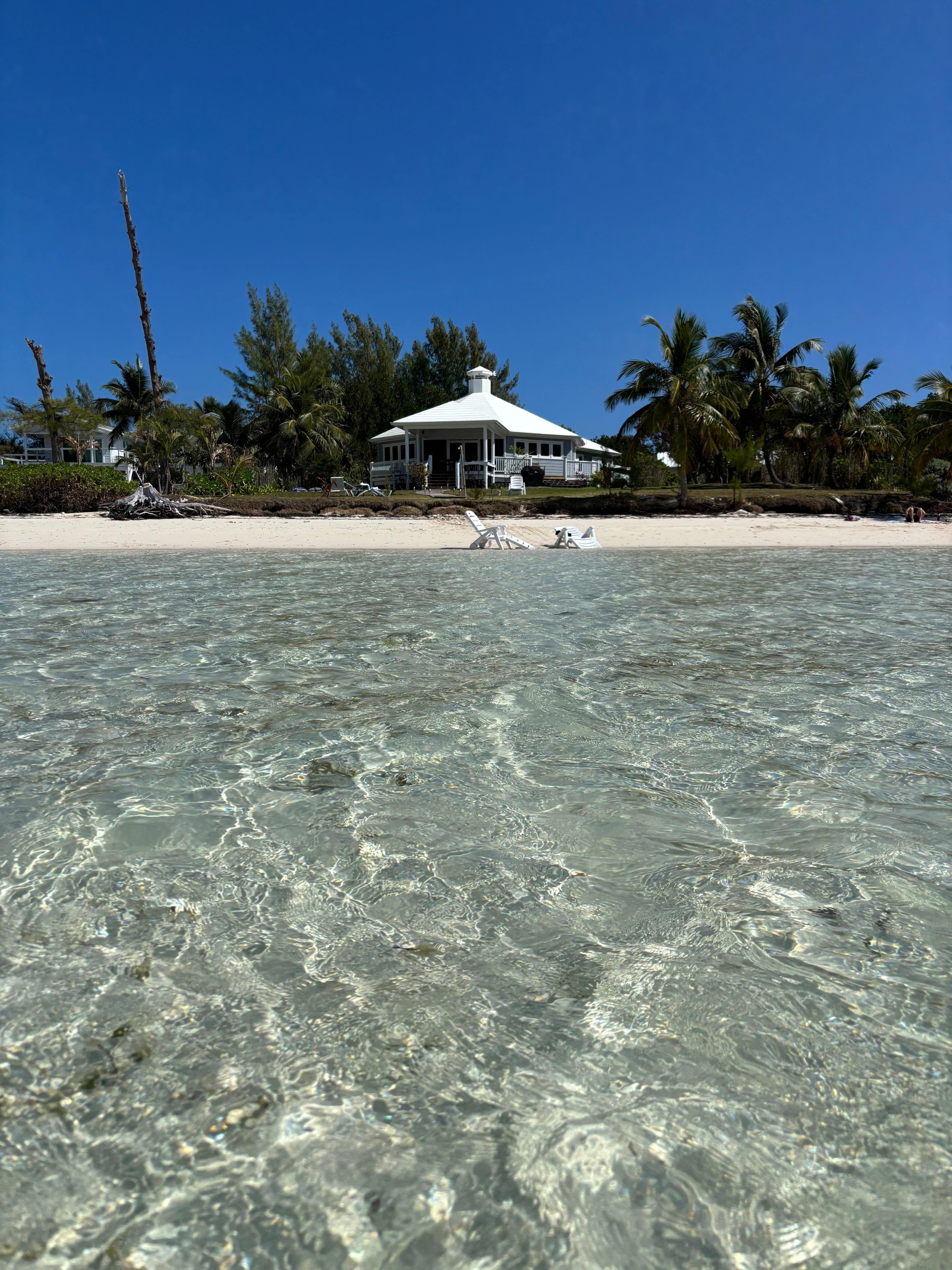Water as clear as a pool everyday of our stay. Shallow for a long way out!