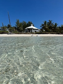 Water as clear as a pool everyday of our stay. Shallow for a long way out!