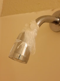 Plastic to keep shower from spraying water everywhwere.