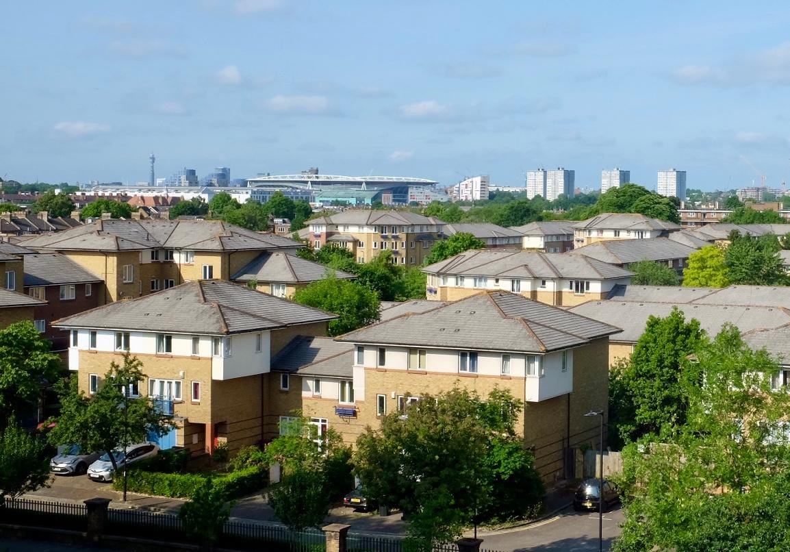 Arsenal FC’s stadium on the skyline put the bedroom window. 