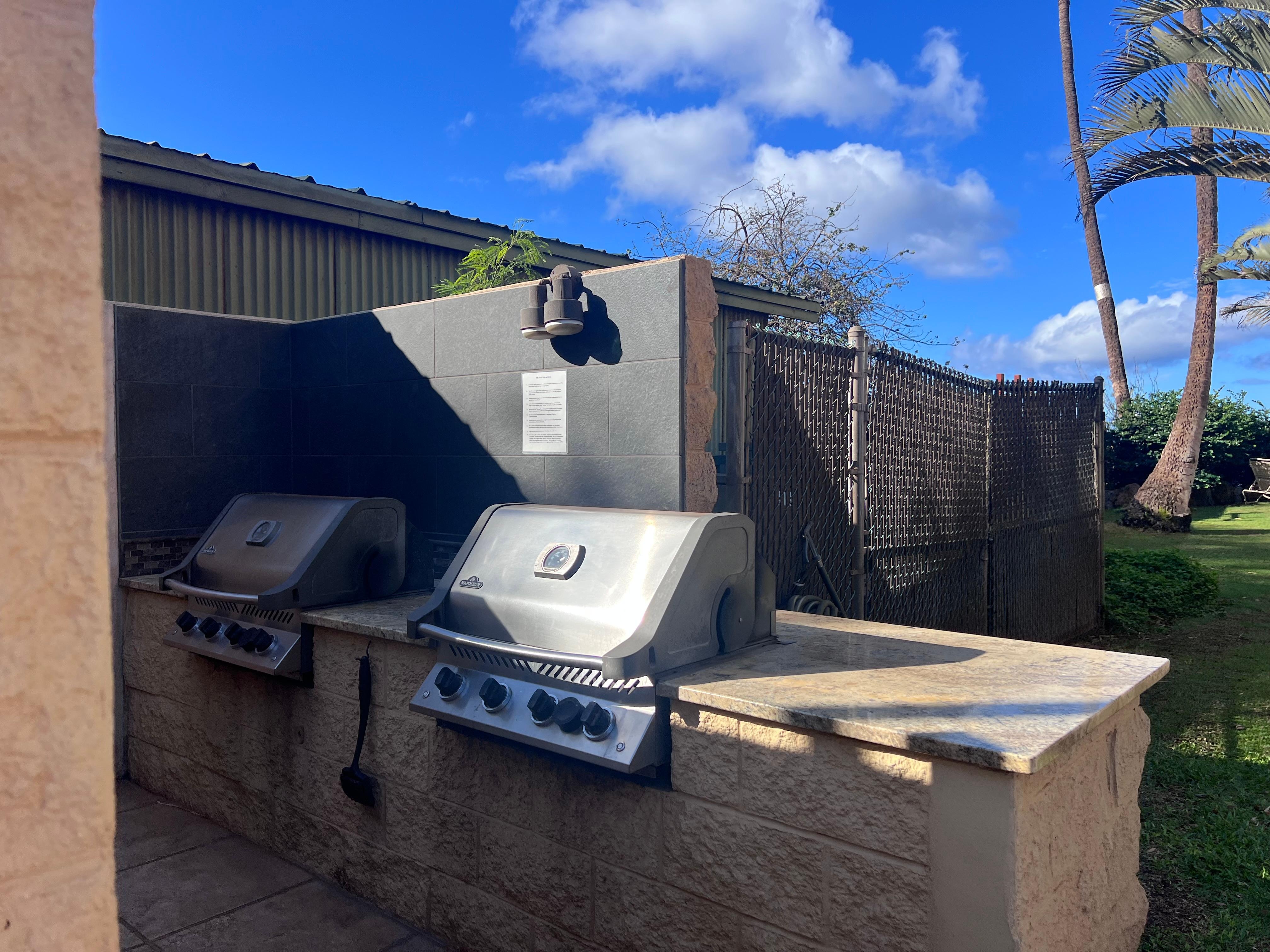 The grills by the dumpster. 