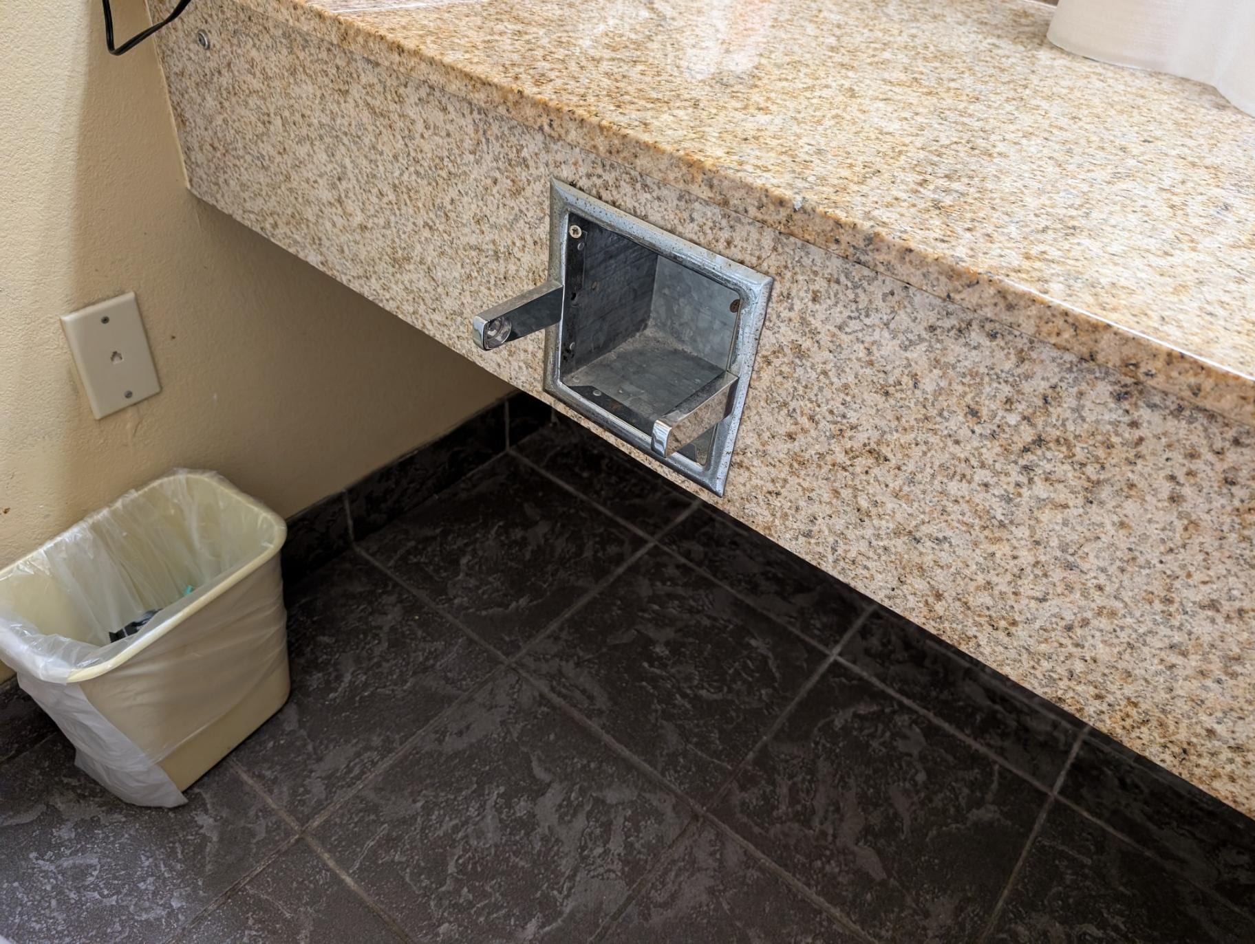 Toilet paper and roller missing (they just gave me a fresh roll but couldn't find a roller.)