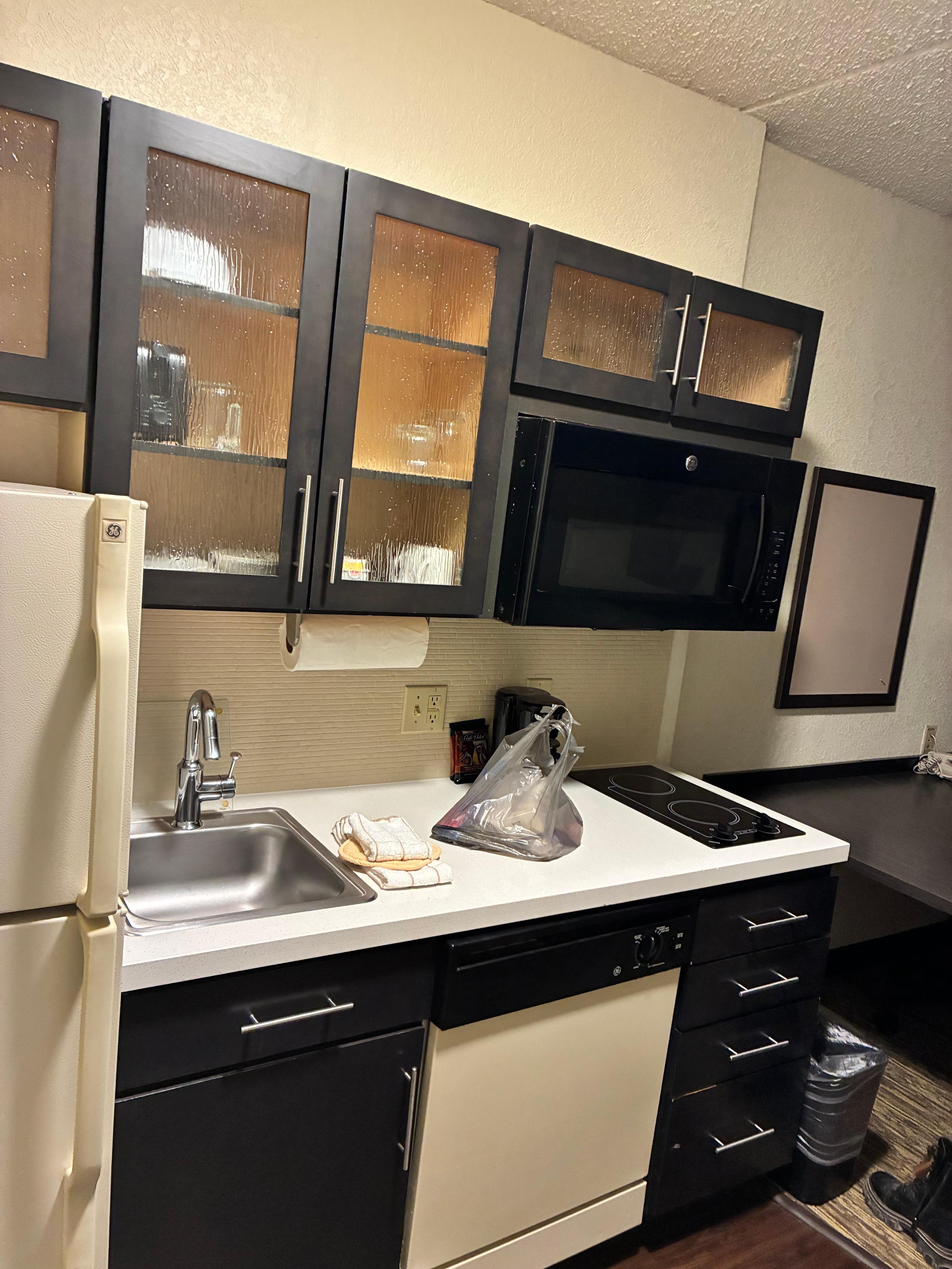 Little kitchenette! Even had silverware, bowls, plates, and glasses! 