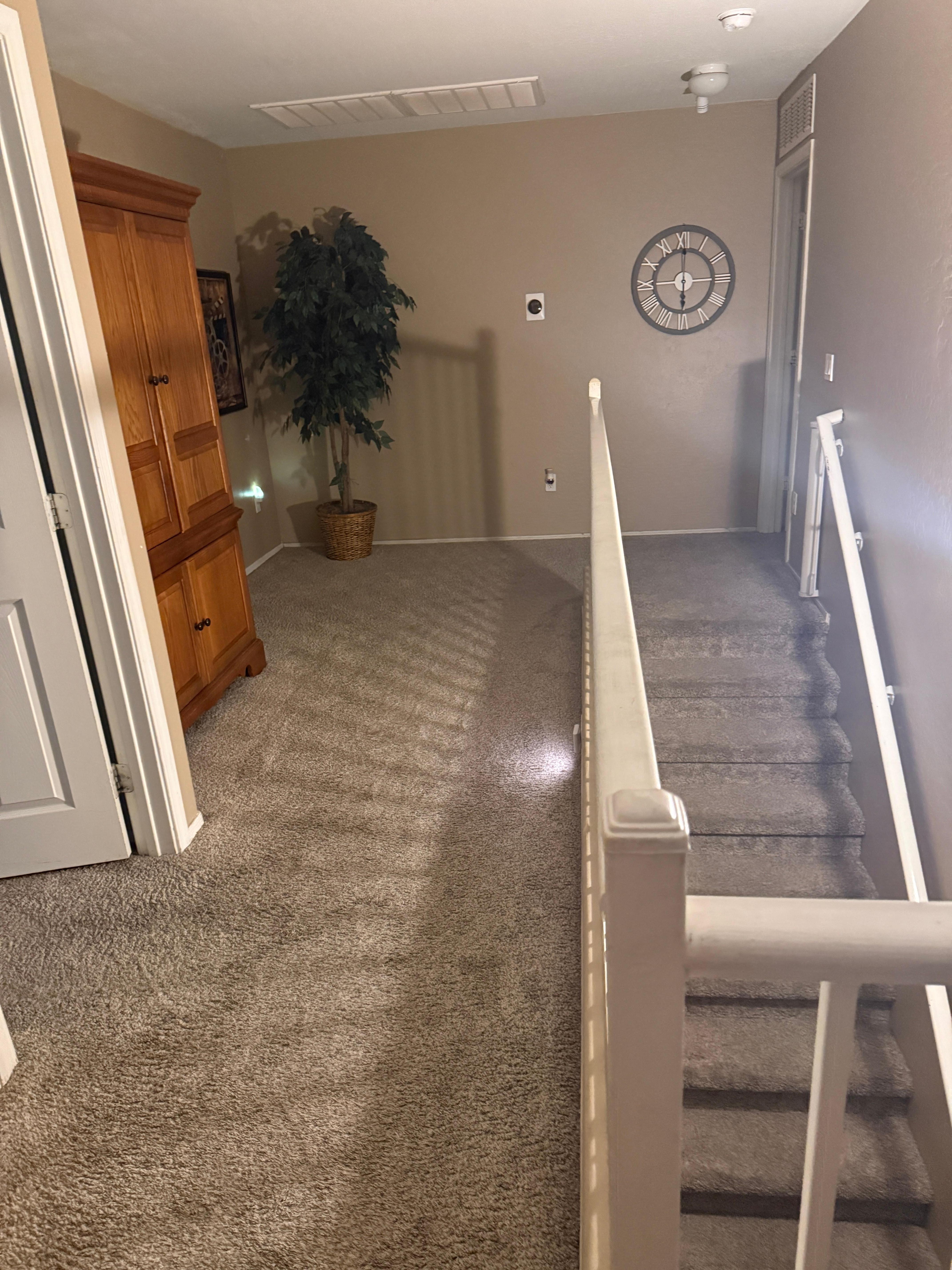 Stairs to the upstairs. Lots of room! 