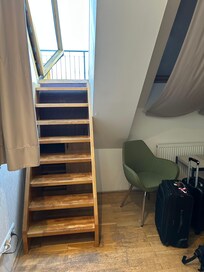 Stairs to rooftop balcony