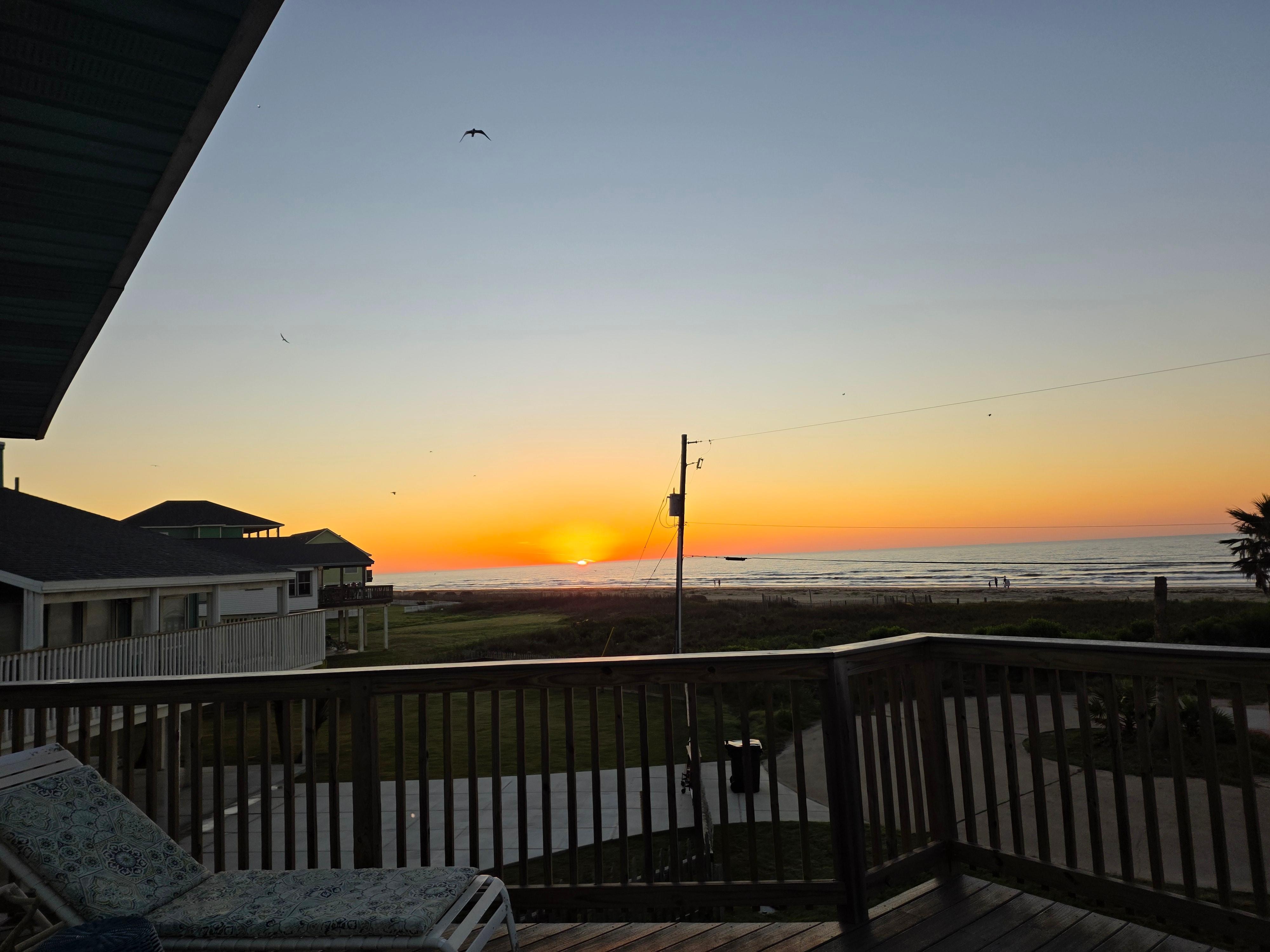 Sunrise from the deck swing.