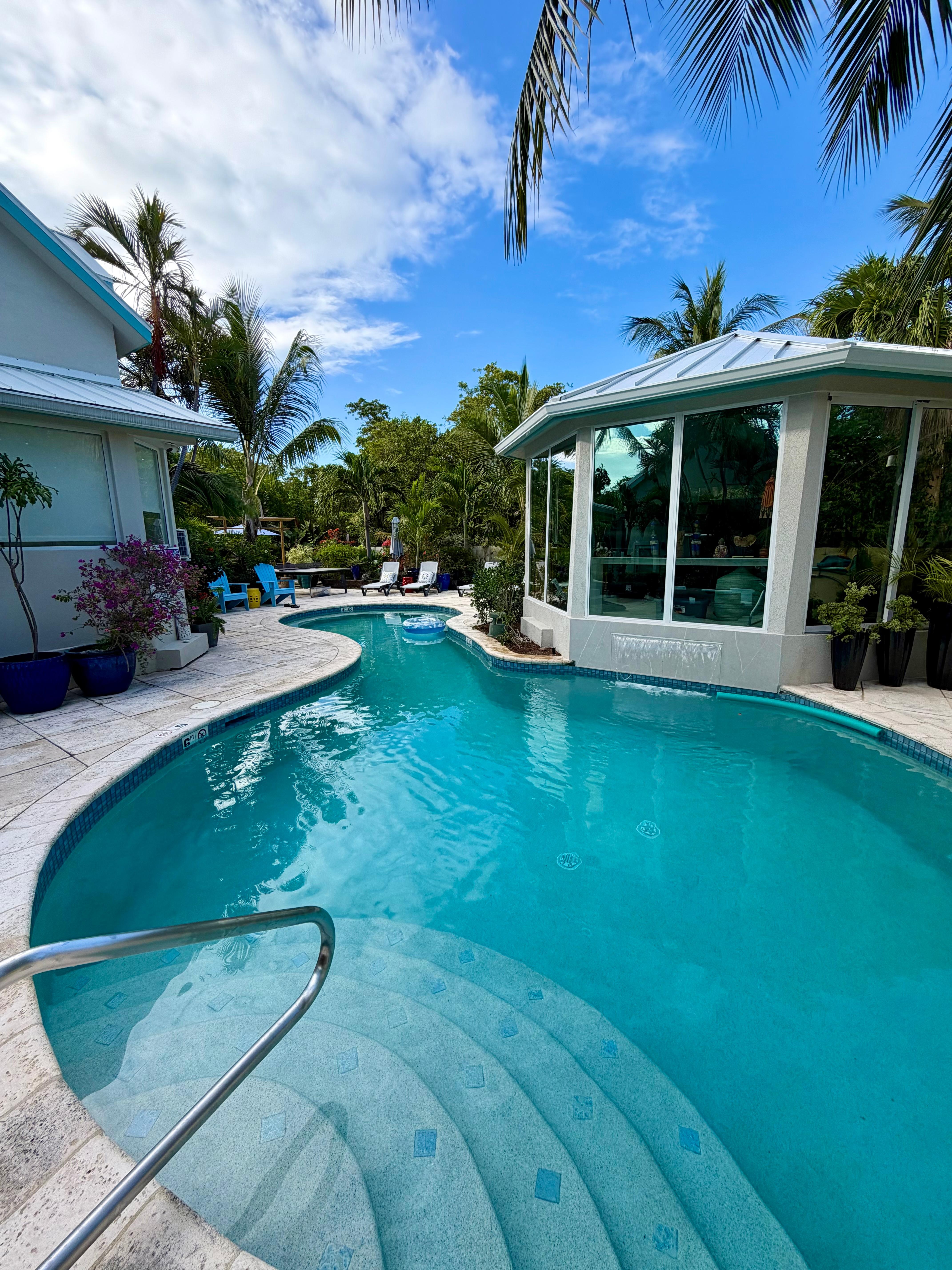 The pool! Goes from 4ft to 6ft deep. It is huge! Also has a waterfall feature 