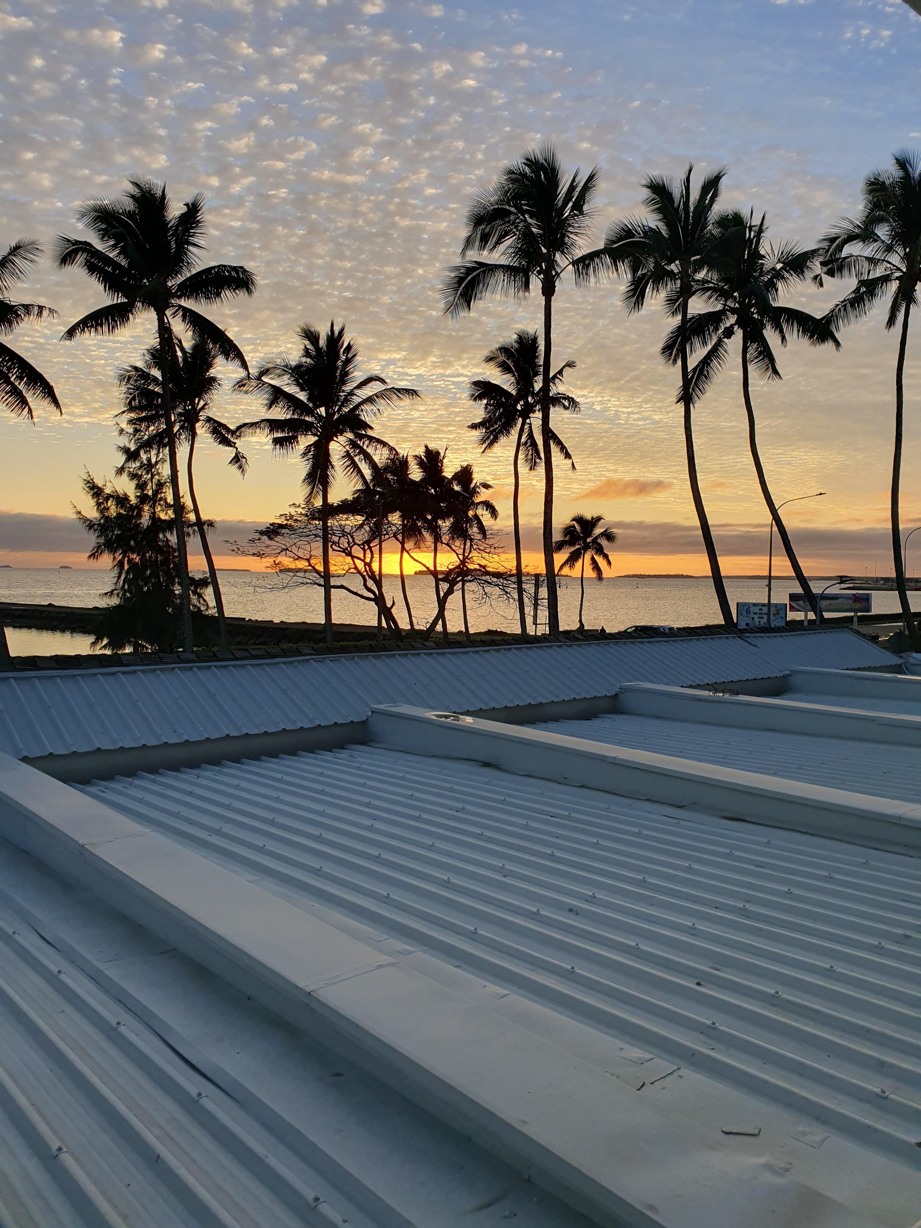View of sunrise from our room window, there was no balcony in these rooms but they did have a great view, no comfortable chair to sit in so i would suggest opt for a room with a balcony