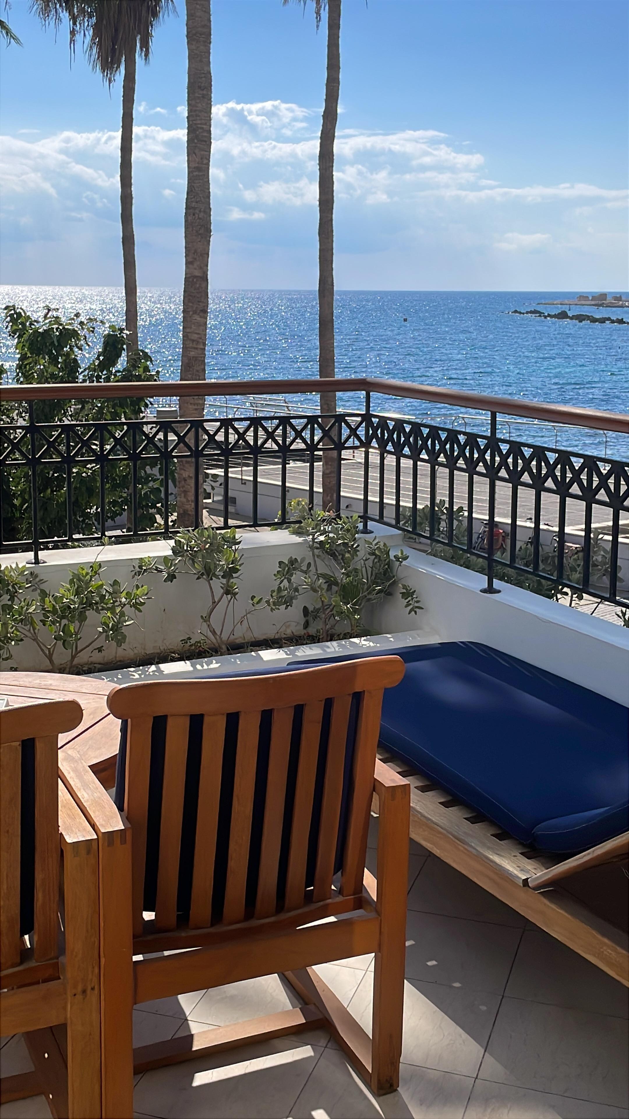 Terrace/balcony with private sunbeds and chairs etc