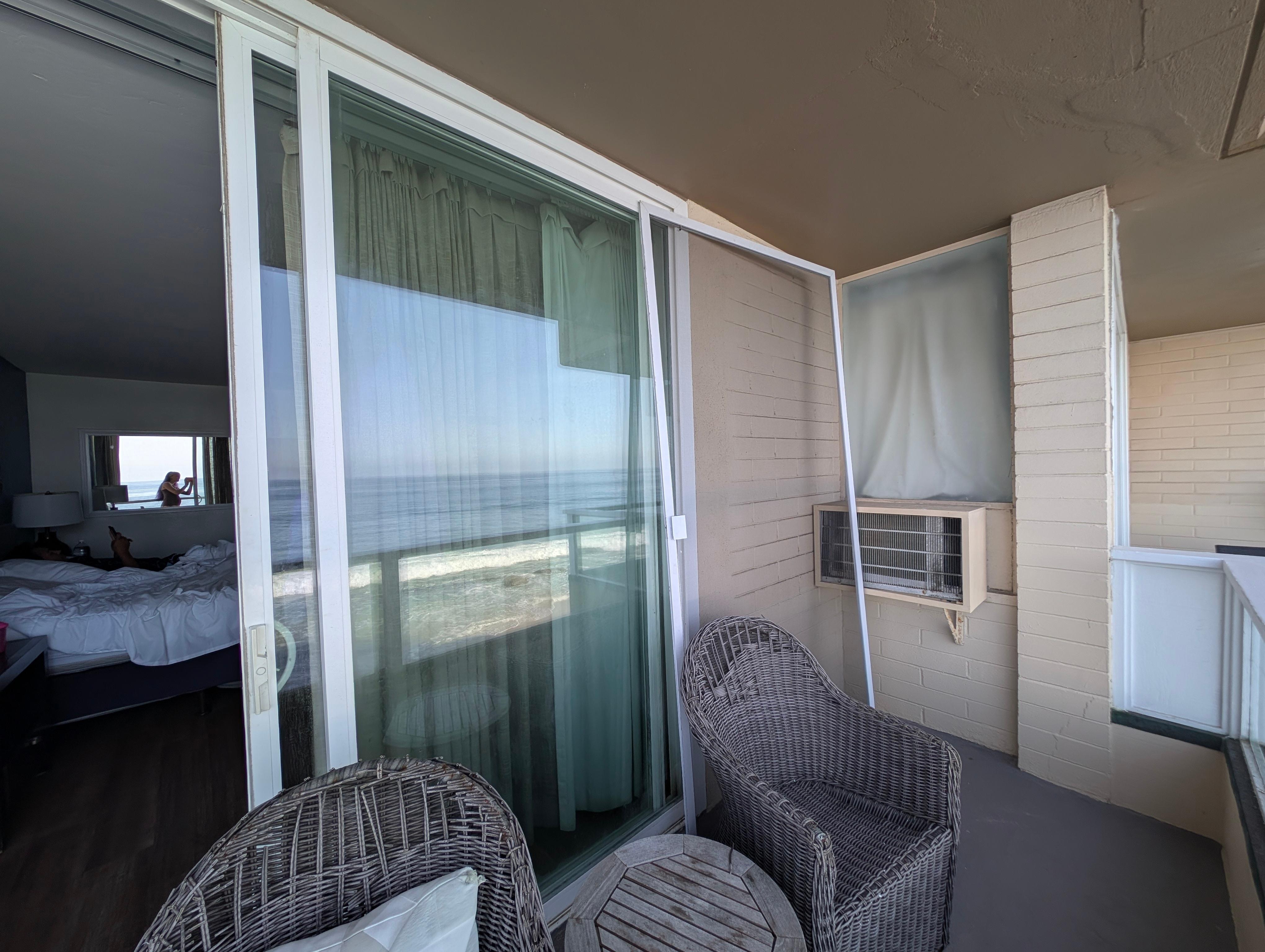 Broken screen door, old noisy AC