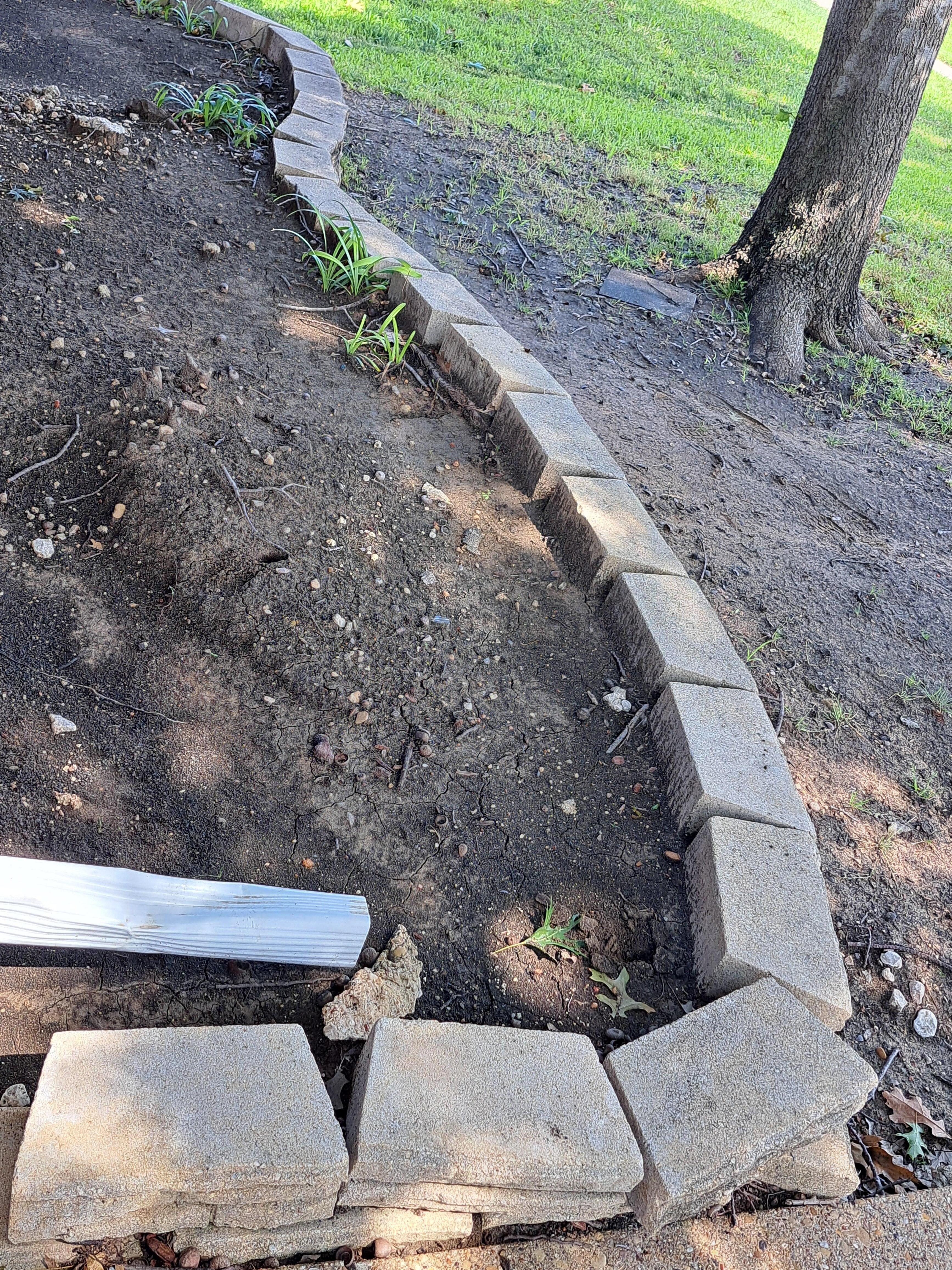 Front flowerbeds are dirt & you have to walk through dirt (mud) to get to the front door bc you park in the back. The cement front steps are falling inward.
