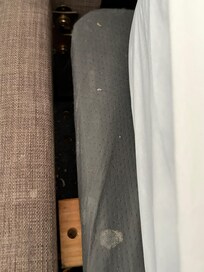 Toenails or fingernails and milk stains(I presume, I hope)