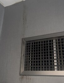 This grime was consistent from the top of the ceiling all the way down to the floor.