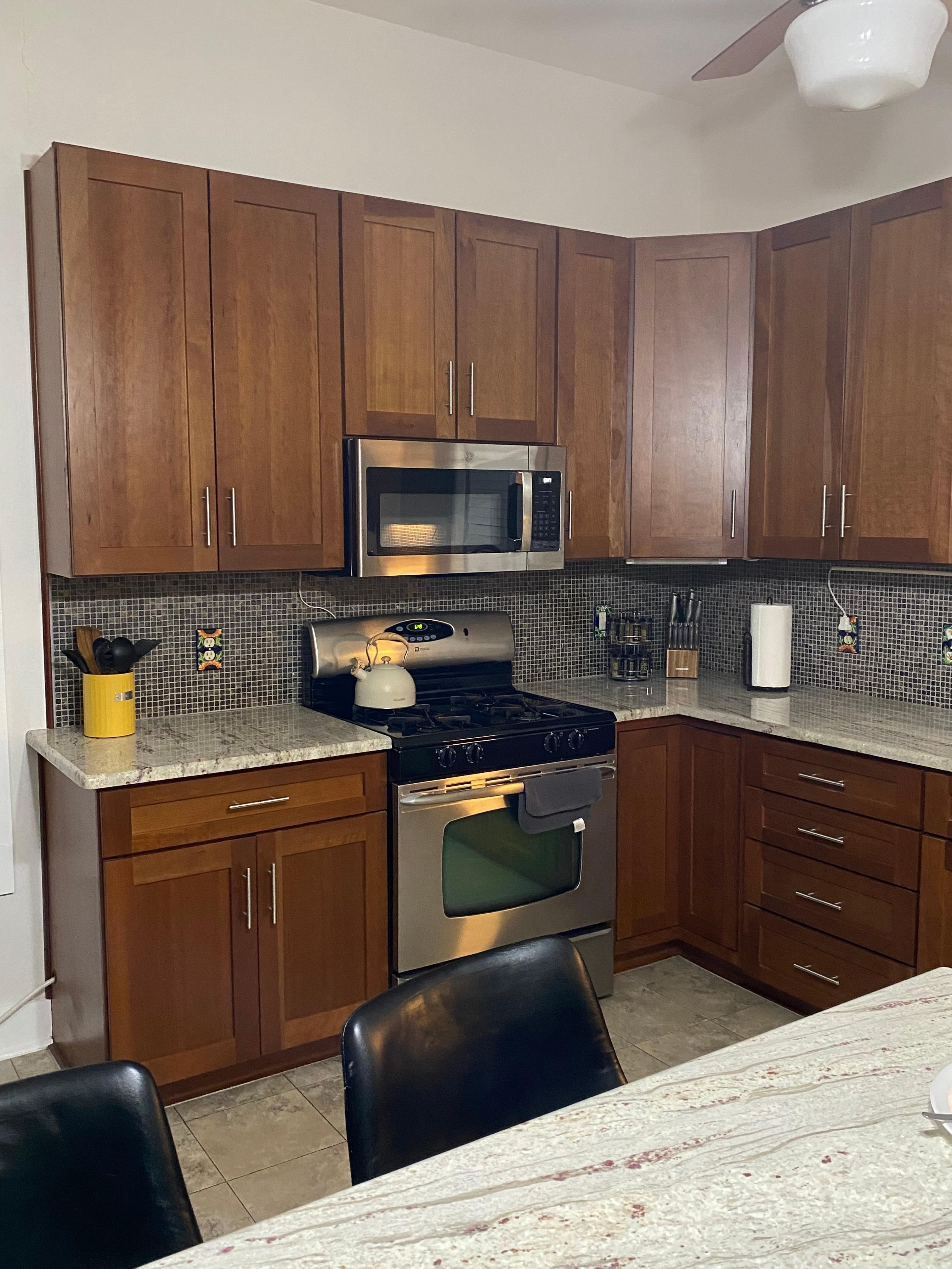 Immaculate kitchen with the cutest teapot!