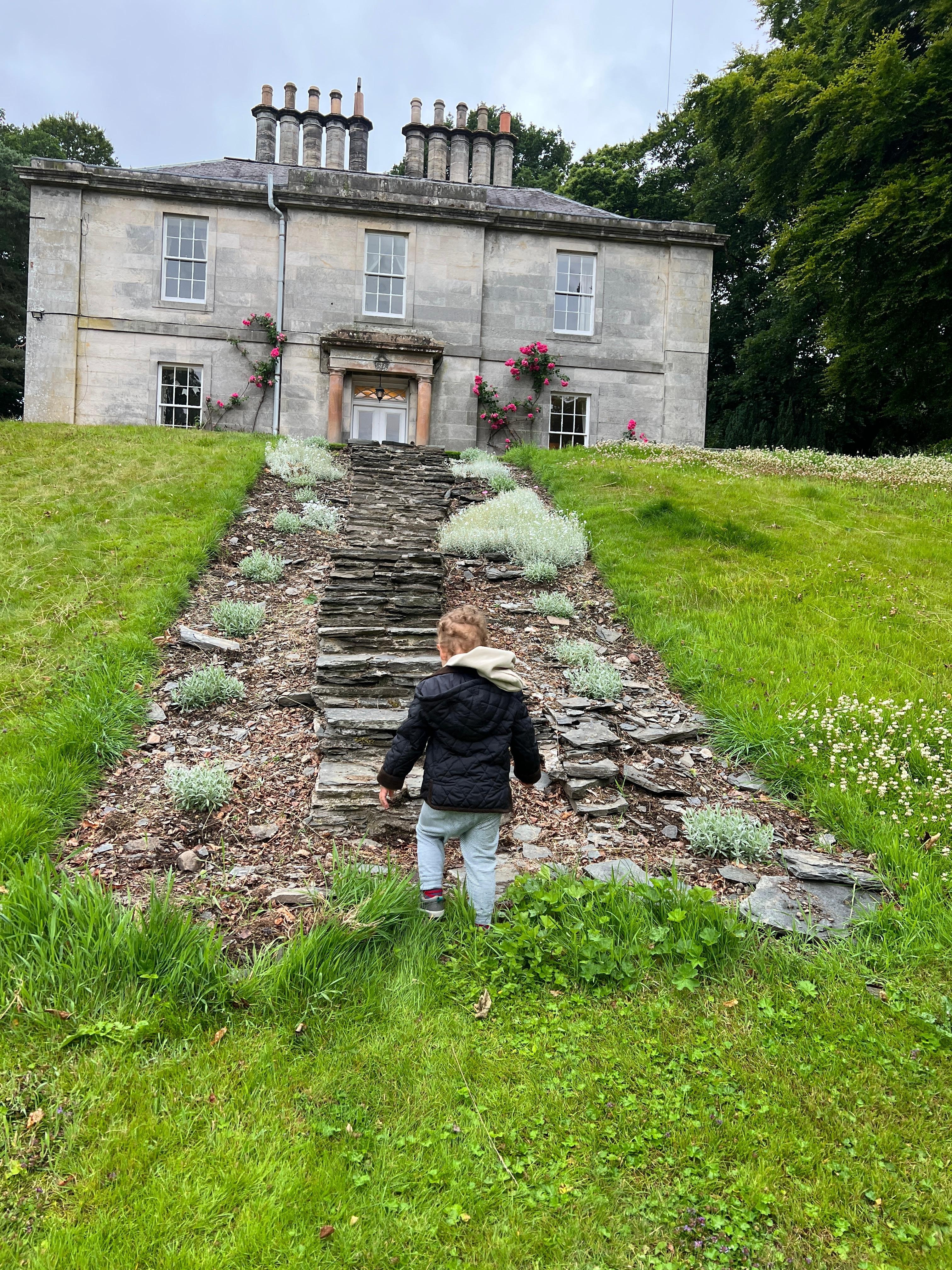 Little guy loved running up and down the hill in the garden 