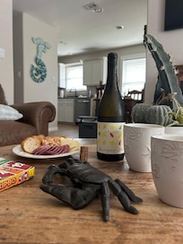 Wine and cheese waiting out some rain. Five minutes to the beach!