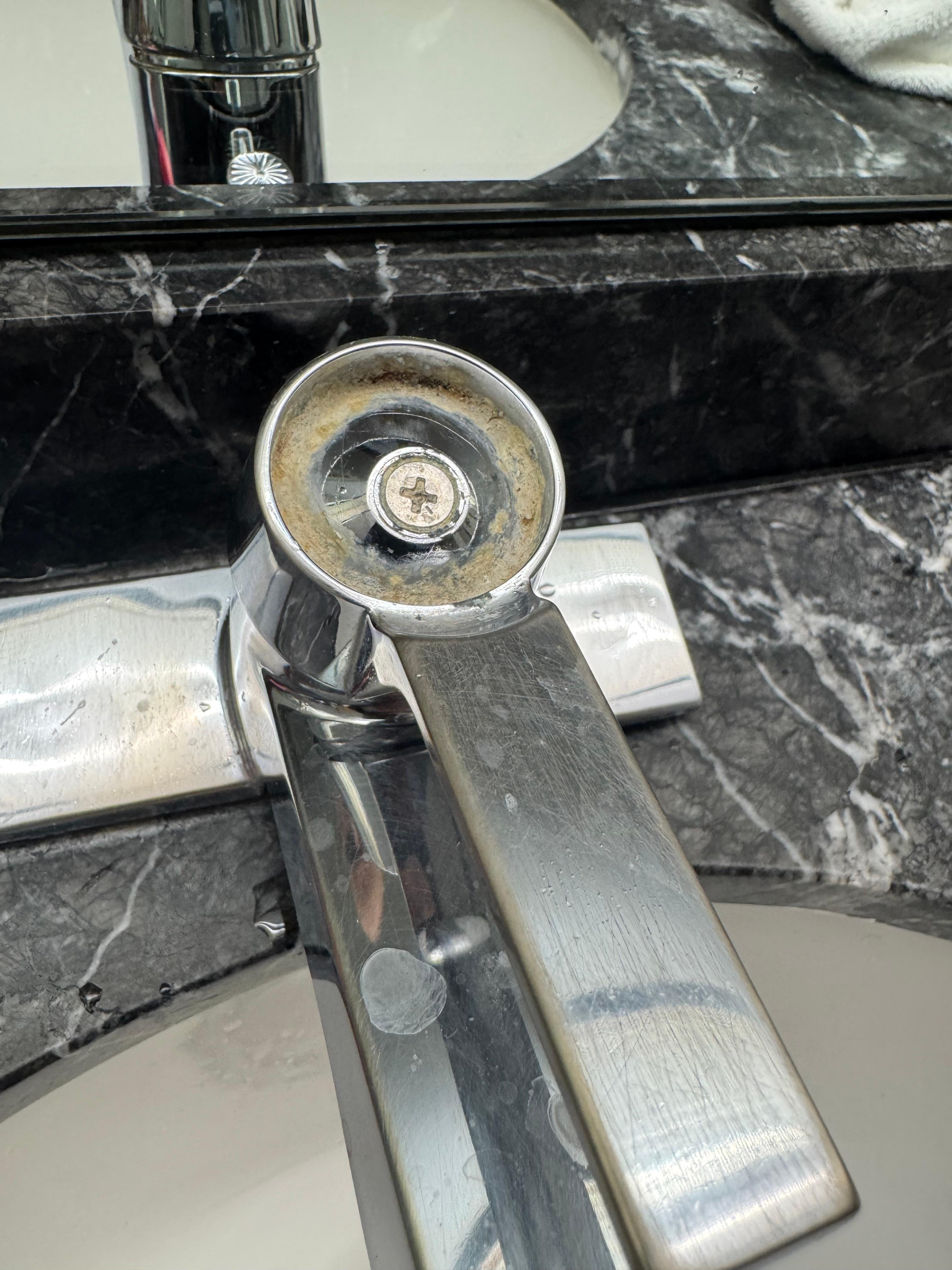 Bathroom faucet broken and dirty