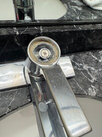 Bathroom faucet broken and dirty