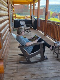 Photo is to show how close the cabins are and the nice view in the distance, and it also shows my mom and I relaxing!