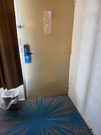 Front door is open towards the bottom. Door was hard to open you had to push on it