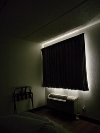 The room at midnight. The street light prevented my room from going dark as I wanted it.