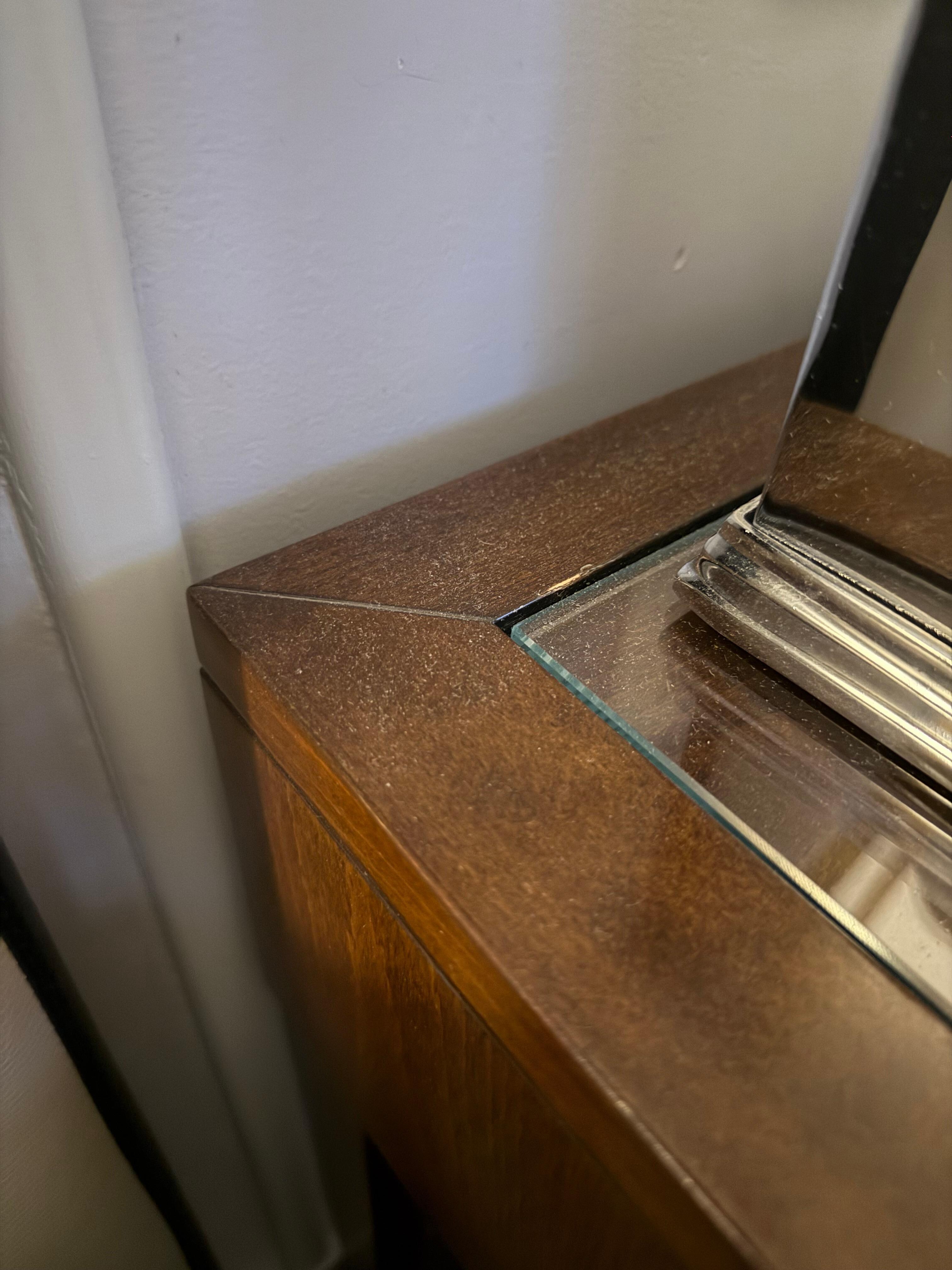 Dust on the bed table in both rooms