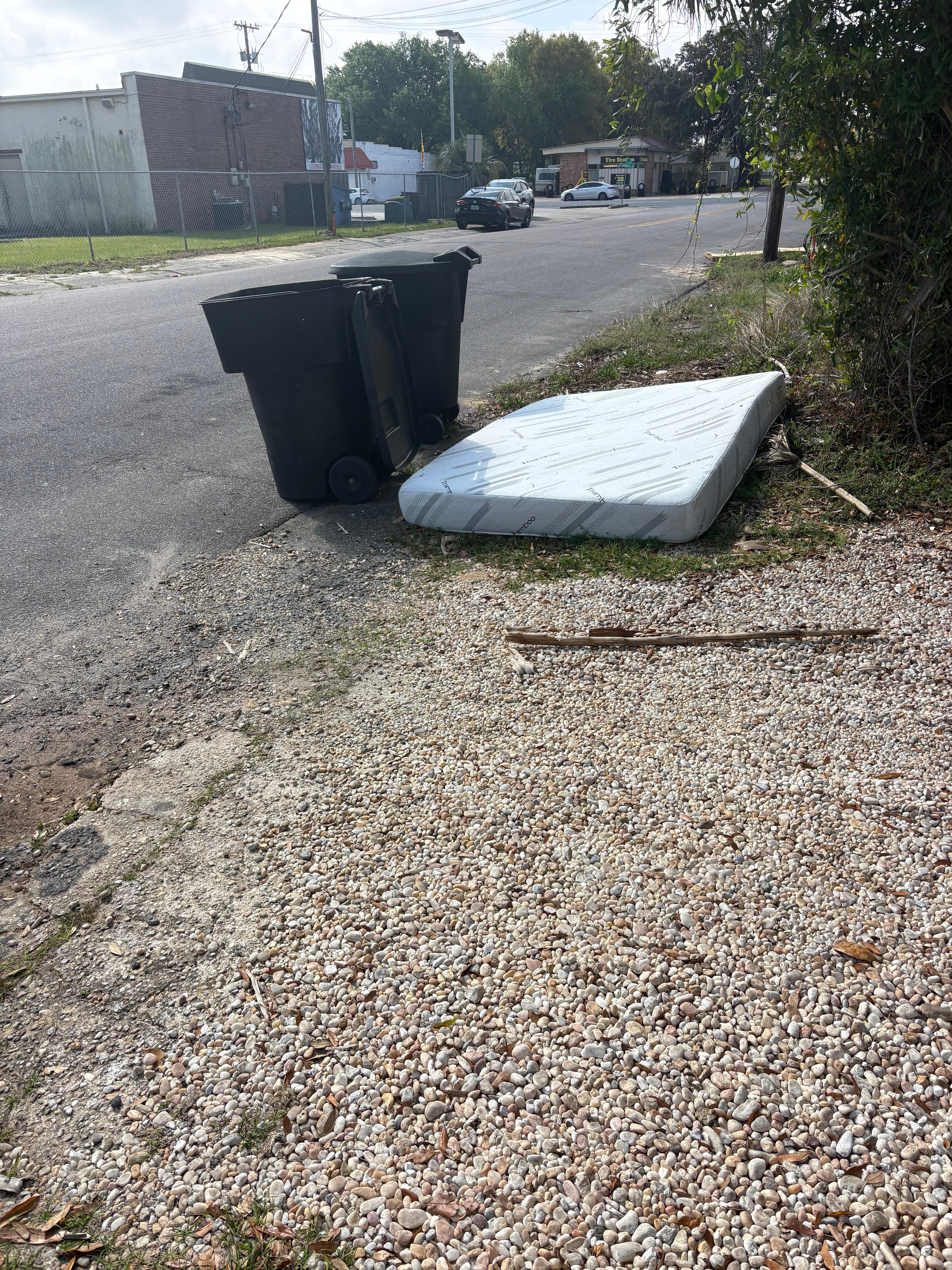 Mattress in front yard 