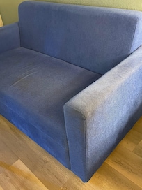 Stained and filthy couch