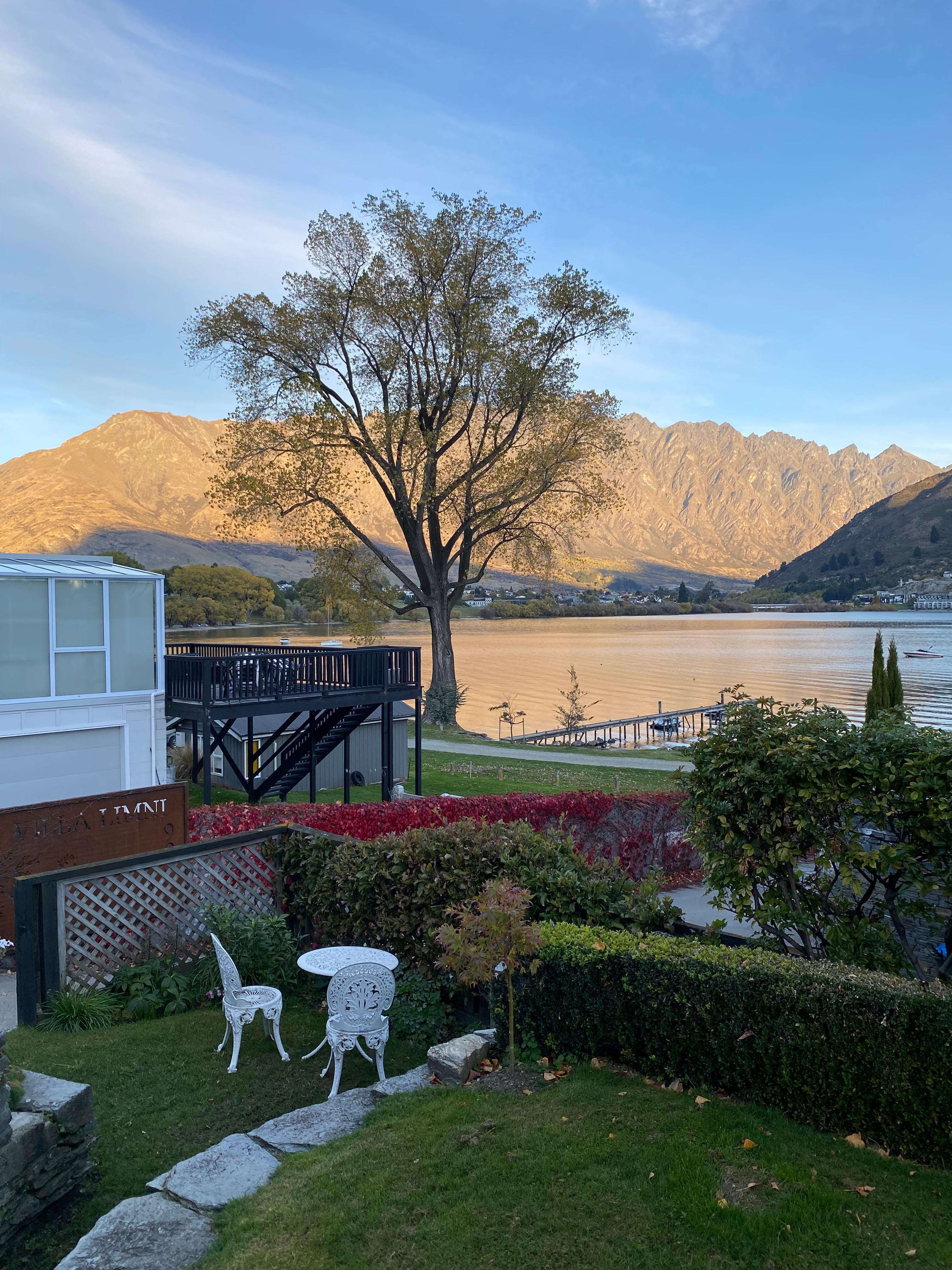 View from doors of property with the Remarkables in the distance and walking trail  