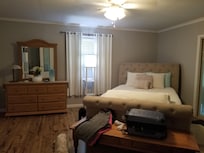 Master Bedroom which has sliding doors to the covered patio.