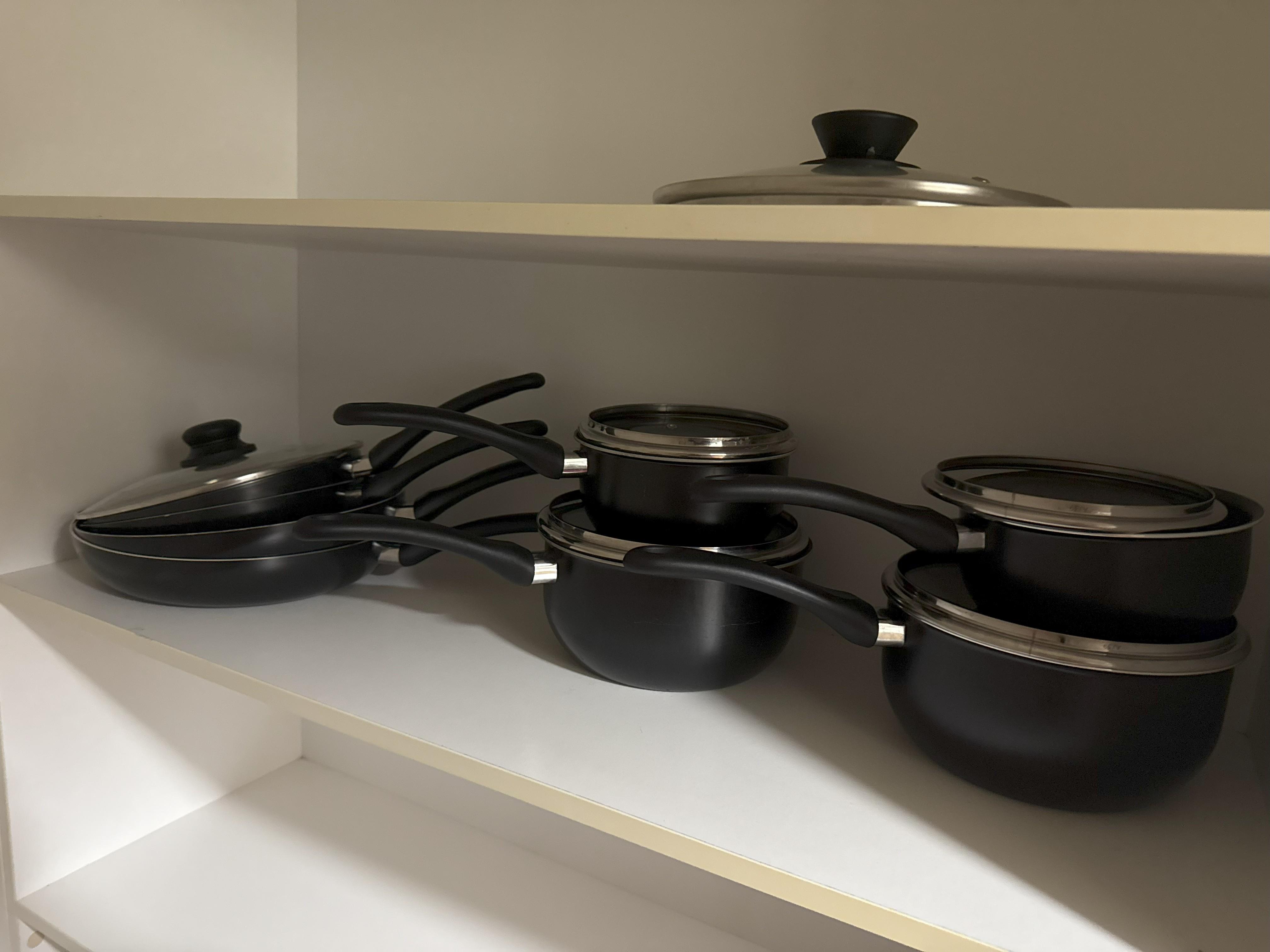 The Kmart pots that are not suitable for the induction cook top.  BYO pots and pans.