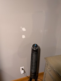 Unpainted wall repair in first floor bedroom