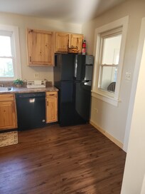 The kitchen's so large I had to fit it in two pictures I loved having a dishwasher