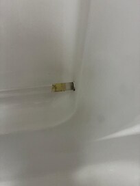 Tub handle broken and repaired with tape.