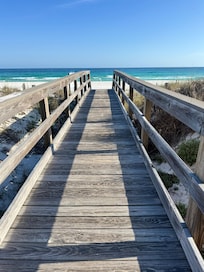 Very short boardwalk from backyard directly to beach
