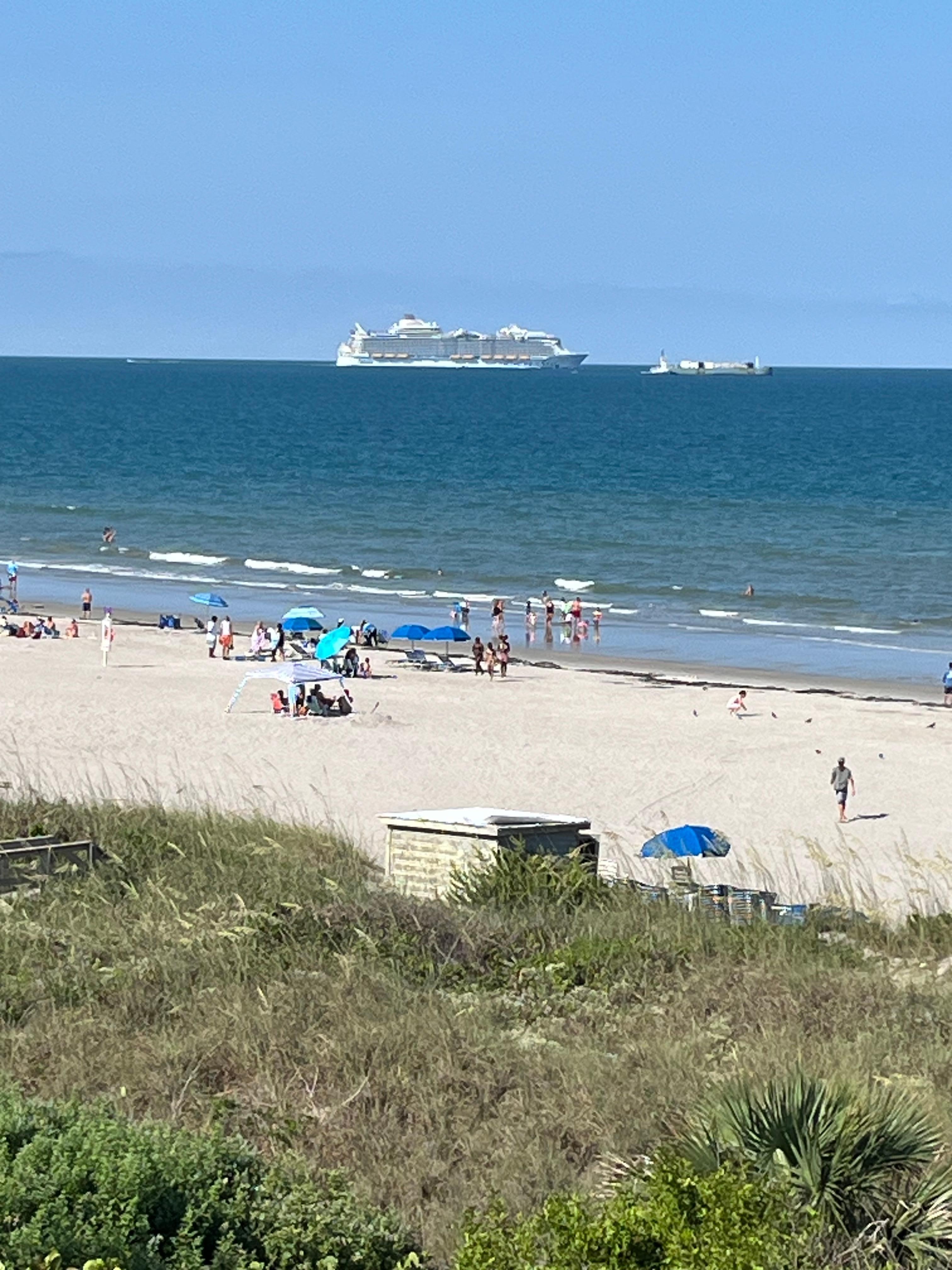 Watching a cruise ship leave port from our hotel balcony.