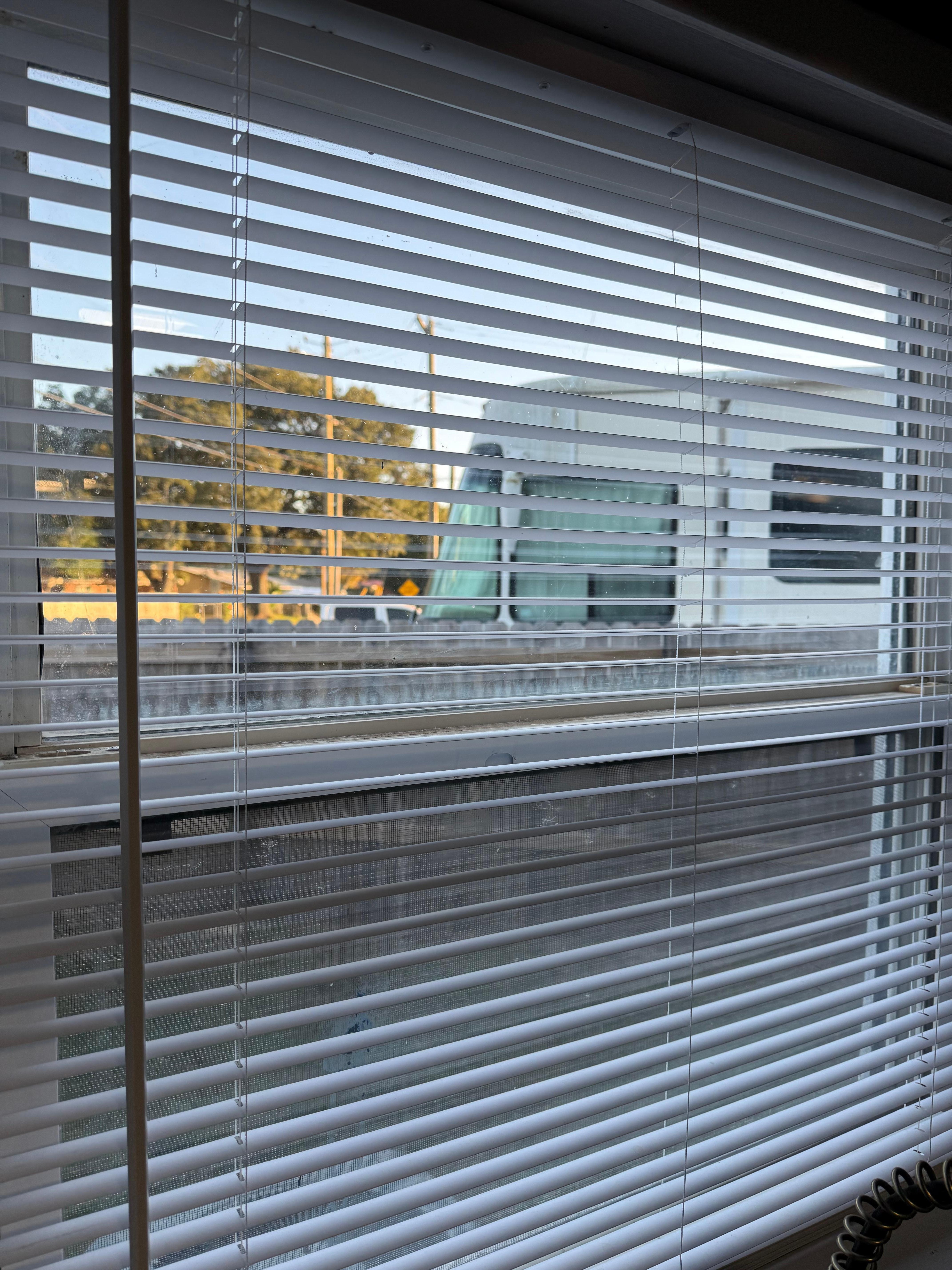 View of RV from kitchen window above sink 