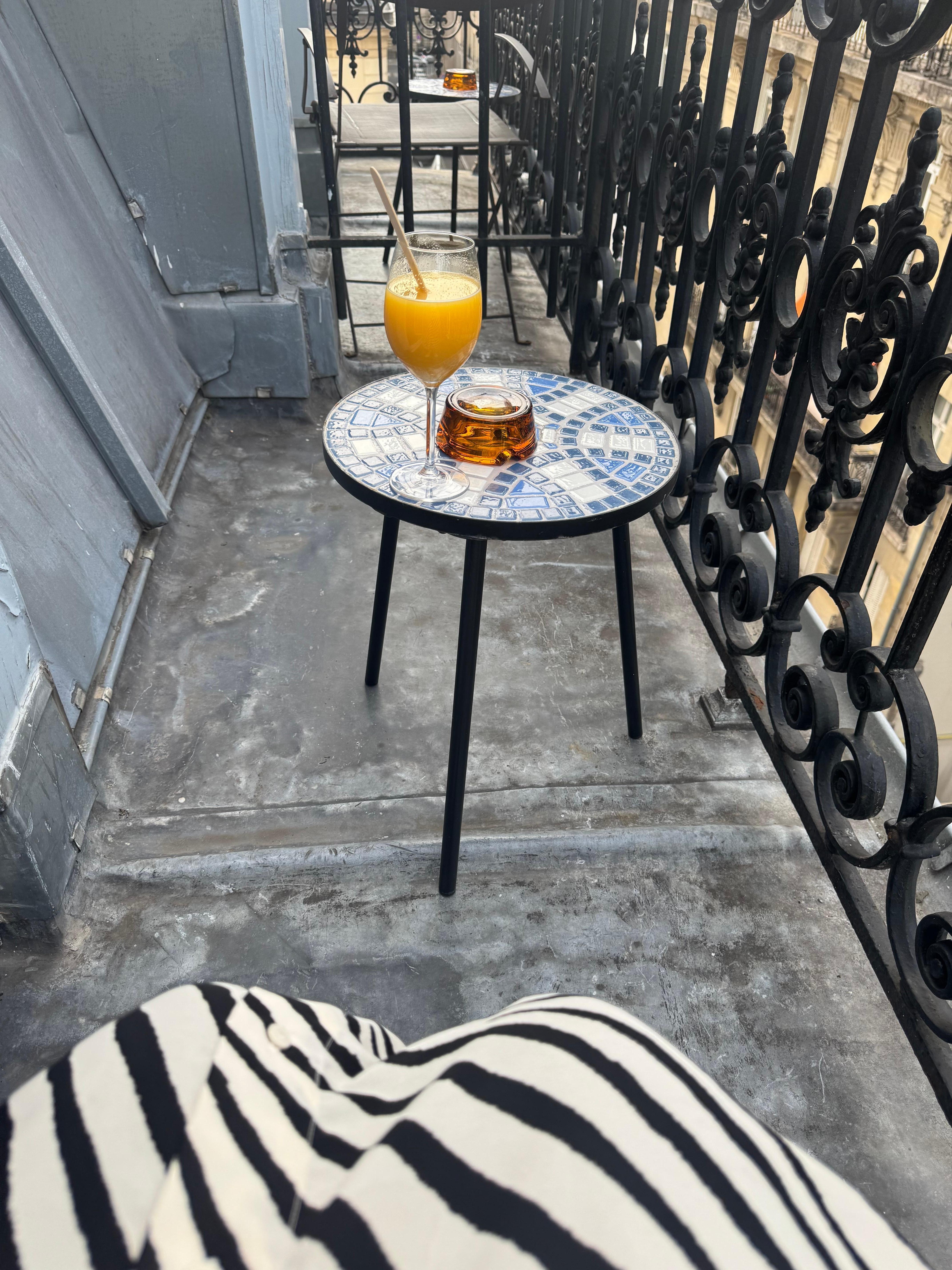 My balcony with breakfast drink.