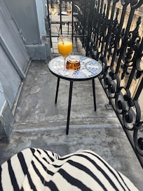 My balcony with breakfast drink.